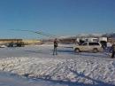 KL7CY "walks-up" the quarter-wave 80m vertical while the ground crew stands by on the guy ropes.  The temperature this morning was -5 deg F.