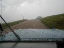 Cracked windshield and ice on the hood.Lots of golfball size hail.