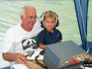 W1GUA, Rudy, shows Grandson Garrett how it's done at the W1IM 2A operation in East Lempster, NH