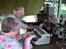 Ace CW op Barbara Lombardi, K1EIR, logs with a Perkins Braillewriter.  Barbara's sending with the 19 Set's 1943-vintage straight key sounded like that of a modern electronic keyer.