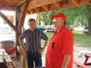 Another Commissioner(on left) stops by to chat about emergency communications with John Poindexter,KA4HWX. 