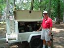 Club President Bob McKenzie K4MLR checks out the generator provided to us by the county rescue squad.