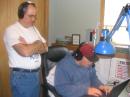 Jake - KC9CRM digs through the calls as Mike-N0BUI looks on