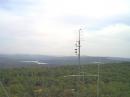 Microwave Tower, 903 thru 24 GHz as seen from the 144 MHz tower. The top antenna is 135 ft above ground.