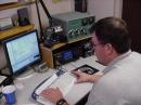 Station owner Mike KØFJ enjoys the technological side of maintaining a modern RTTY ham station, and is a skilled runner as well.