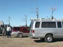 John Desloge, N6MU, points to the south toward Sacramento from CM99, at the north end of the January, 2006 route followed by W6XD/R (operating in the Ford van), N6MU/R (in the Subaru Baja) and K6VCR/R (in the Ford F-150).  With John are Rob Hughes, KG6TOA (left) and Hank Feilen (right).  Art Goddard, W6XD, and Tom Sneden, K6VCR, were both operating and missed being in this photo, taken by N6NB.
