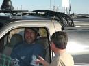Dave, N6TEB (seated at the front console in his Excursion), talks with N6DN.
