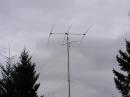 3 element SteppIR with cross brace for top of K1WA sloper array.   At the bottom of the cross brace is the apex of the 80M inverted Vee.