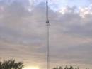 The main tower with stacked yagis and 40. Photo taken from near the 160 tower, used as a halfwave on 80 for this contest.