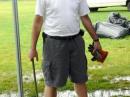 Alan, N2YGK, our ARES/RACES head standing in our grounding water field.