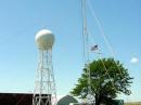 N0XJ's outriggered crankup is inaugurated with cw TH3, 6M yagi and G5RV, while the venerable 40+ year old club tower trailer sports ssb TH3, dipoles and Old Glory near the terminal building awning, site of Trojan ARC's 2006 FD