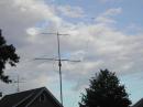The 2M and 6M beam with the 80M dipole center insulator flying overhead.