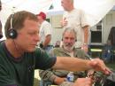 Bruce, KE7BWN, enjoys new phone priviledges as a General Class licensee as Wilse, WX7P, offers an approving nod and Karl, KC7KPA, gives a critial eye toward the 2 meters setup.