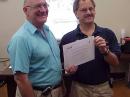 Here is Vince KI4AOC Berkeley County ARES EC acceptind a certificate of achievement for our Field Day from our Section Manager Jim N2ZZ