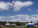 90 foot crane with antenna.