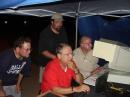 David Lusk N5UV (L), Chuck Poindexter KE5HGQ (M), Jerry Keltner KB6OJE (R), and Norm Yeager KB5UXG (foreground)operating PSK31, all trying to figure out one thing...what's up with all the green lines?