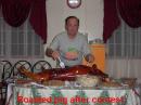 Whole roasted pig feast at end of contest