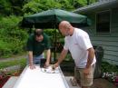 WA2EQF and WB2PJH working on the solar panel