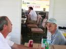 L-R  Keith W4KTR and George W4IW discussing Field Day Operations