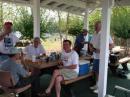 L-R  Ellis K4PEM (standing), George W4IW, Jim K5IK, Lex W4XO, Scott KK4Z and Jim AE5M taking a break before contest begins