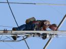 Toby Fowler, KG4AVJ, mounting the 20M Quad on the tower