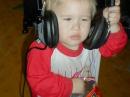 Here's a pic of daddy's little operator/gopher getting bored with just listening, and more than ready to finish his bag of chips.  
