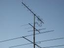 Note the 23cM coax dipole mounted to the mast between the 70cM and 2M yagi'. 

Used 30' of RG-58 and made contacts 30 miles away with S9 signal report.