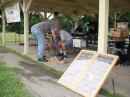 KC7EHJ Stan and KA8IPO setting up the bicycle powered generator and solar panels.