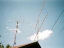 View of 222, 432 antennas after installation ... 6-m beam above the Force-12 in the background and the StepIR is to the right.