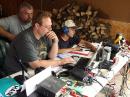 Josh Beeson, N9GQA (center), works on setting up a digital operating position as Steve Phillips, NX9N, looks on and Jordan Carter, K9NZF, checks SWR on his new Icom IC-7000 as the emergency communications group EmComm ECI sets up the W9YFD Field Day site in Muncie, IN on Saturday, June 23, 2007.