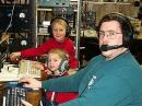 Ed, K3DNE on right with helpful harmonics Derek (middle) and Jake (top, center).  The boys always like to visit and "operate" with dad during contests.