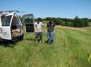 Jim, KC8JPZ (gray shirt) and myself (black shirt) getting ready to set up at W8GTS's farm, EM89.