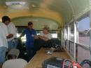 Russell Wright, KE5KGL, center, and Joe Earley, N5FVN, right, enjoying the field day accommodations.